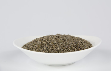 sesame in a white plate isolated on white background