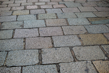 Ancient stone pavement, oled square rock floor.