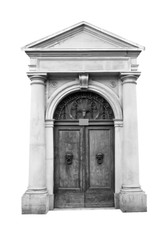 Fototapeta premium Wooden door in an old Italian house, isolated on white background, clipping path. Black and white.