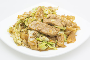 Noodles fried with pork and vegetable.