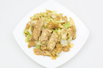Noodles fried with pork and vegetable.
