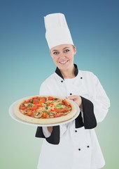 Chef with pizza against blue green background