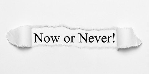Now or Never! on white torn paper