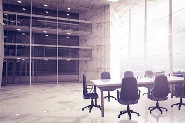 Fototapeta premium Composite image of empty office chairs and table