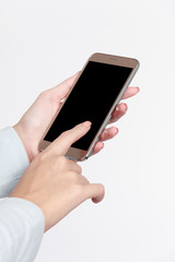 Isolated female hand holding a phone with white background.