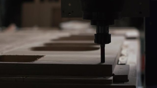 Automatic milling cutting wood machine ready to start. Closeup. Slowmotion.