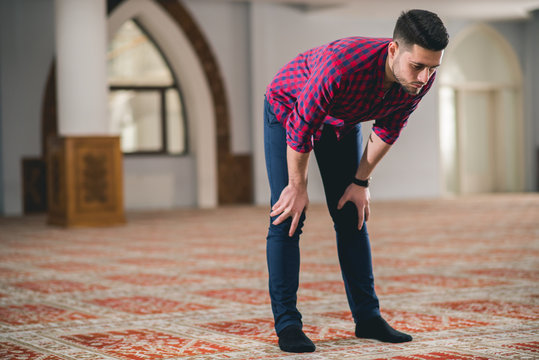 Muslim praying in bow position