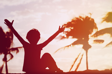 happy boy enjoy sunset beach