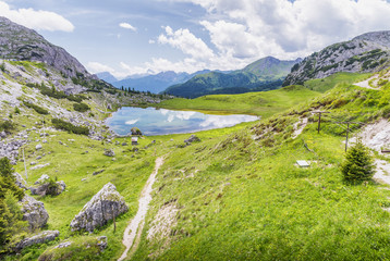 Fototapeta na wymiar Beautiful lake among Dolomites Mountains, Italy