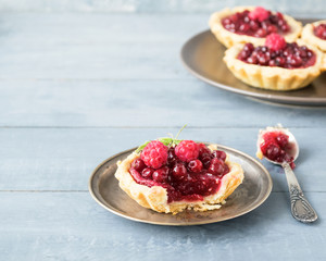  Fresh crisp tartlets filled with jam of raspberries, blueberries, berry pie