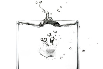 Ice cubes in a glass of water