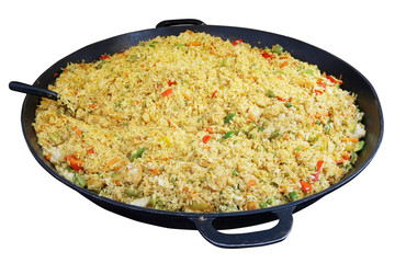 Fast street food - vegetarian pilaf with vegetables and curry spice in a steel big frying pan.