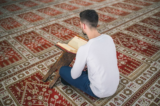 Muslim Man Reading Koran