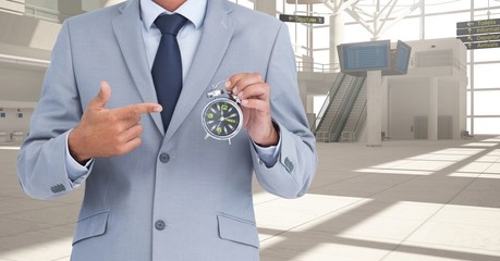 Composite image of Businessman Torso against modern place