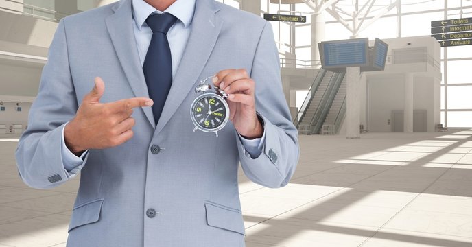 Composite image of Businessman Torso against modern place - Powered by Adobe