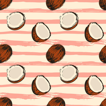 Seamless pattern with coconuts on striped grunge background. Vector illustration