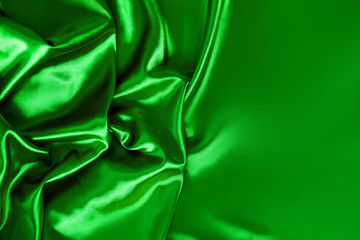 texture silk cloth fabric folds background, top view
