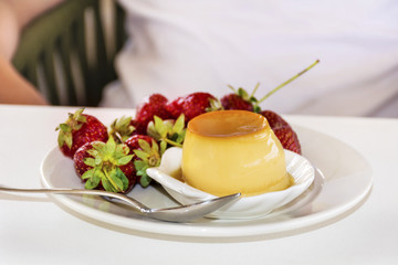 Caramel custard pudding in white plate
