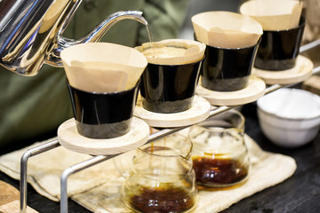 Professional barista preparing coffee alternative method