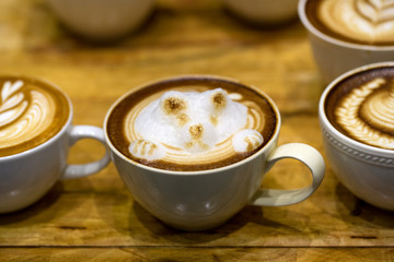 art latte on a cappuccino coffe cup