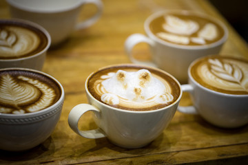 Obraz na płótnie Canvas art latte on a cappuccino coffe cup