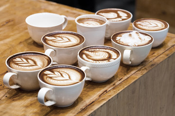art latte on a cappuccino coffe cup