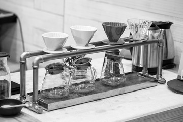 Obraz na płótnie Canvas Drip coffee with blurred Barista background restaurant cafe