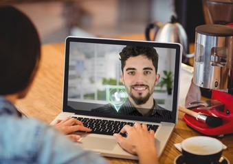 Female executive having video calling with colleague on laptop