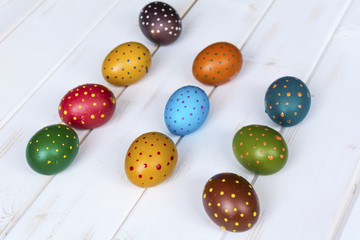 beautiful  easter eggs  with dots on a wooden background  .Easter decoration