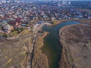 Autumn park. Pond in the autumn park. Aerial view.