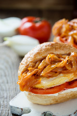 Sandwiches with fried chicken breast and onion sauce