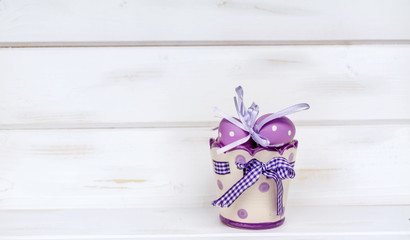 easter eggs on a white wooden background