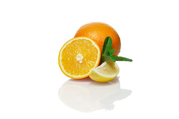 Orange, lemon and mint isolated on white background with shadow and reflection