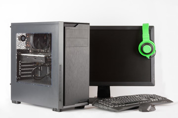 Midi tower computer case with led monitor on white background.