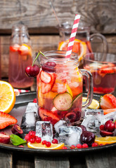 Healthy infused detox water with fresh berries and fruits