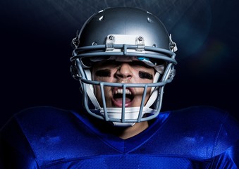 Close-up of aggressive american player in helmet