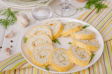 Omelet roll with cheese, garlic and herbs