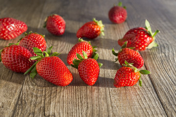 Strawberries, rustic wood