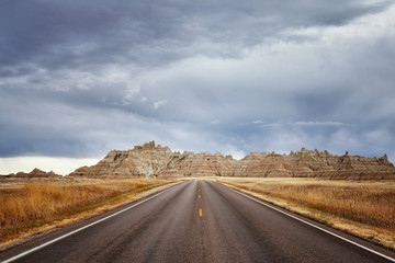 Scenic road in Badlands National Park, vacation background, South Dakota, USA. 