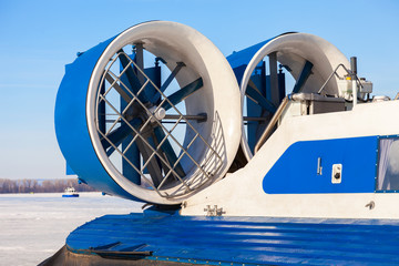 Turbo-prop engine of a naval hovercraft on the ice of the frozen river