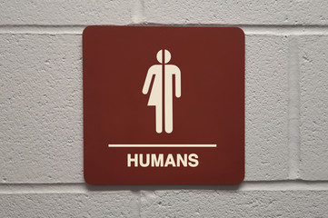 Close up of gender neutral restroom sign