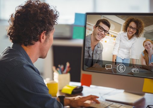 Man having video call with colleagues on computer - Powered by Adobe