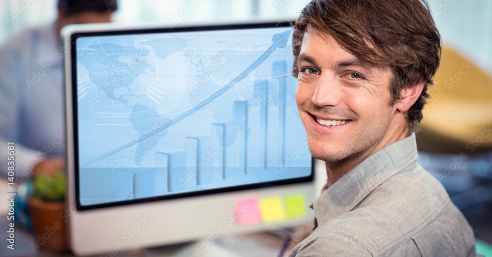 Aufkleber portrait of smiling man working on computer at desk
