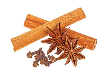 Cinnamon sticks, anise stars and cloves on a white background, Spices