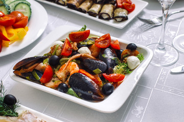 Salad from sea reptiles with tomatoes