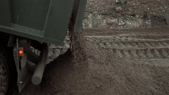 Heavy Duty Dump Truck Dumping Soil, Road Works