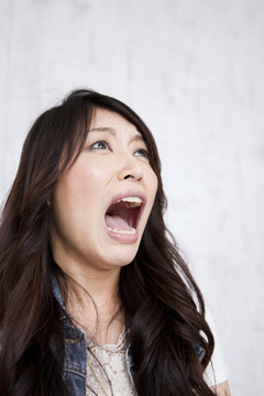 A young woman shouting