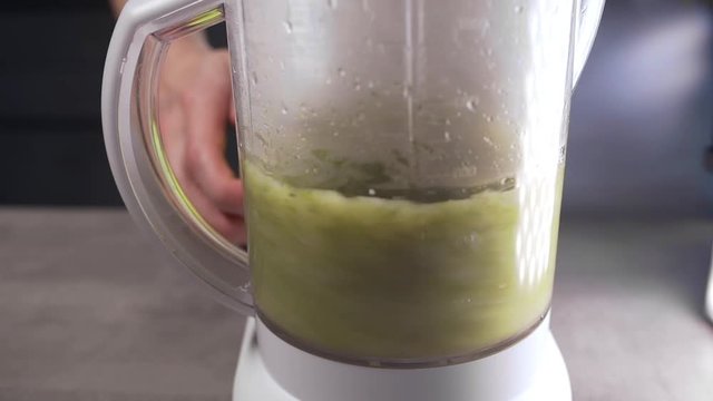 Vegetables are grinded in a blender, vegan food, healthy and diet meals, vegetables puree