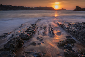 Obraz premium Sunset in the Portio Beach. Liencres. Cantabria. Spain.