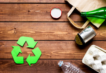 Eco concept with recycling symbol on table background top view mock-up